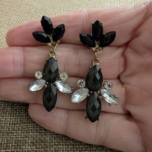 gold-tone drop dangle clip on earrings with black and clear faceted accents